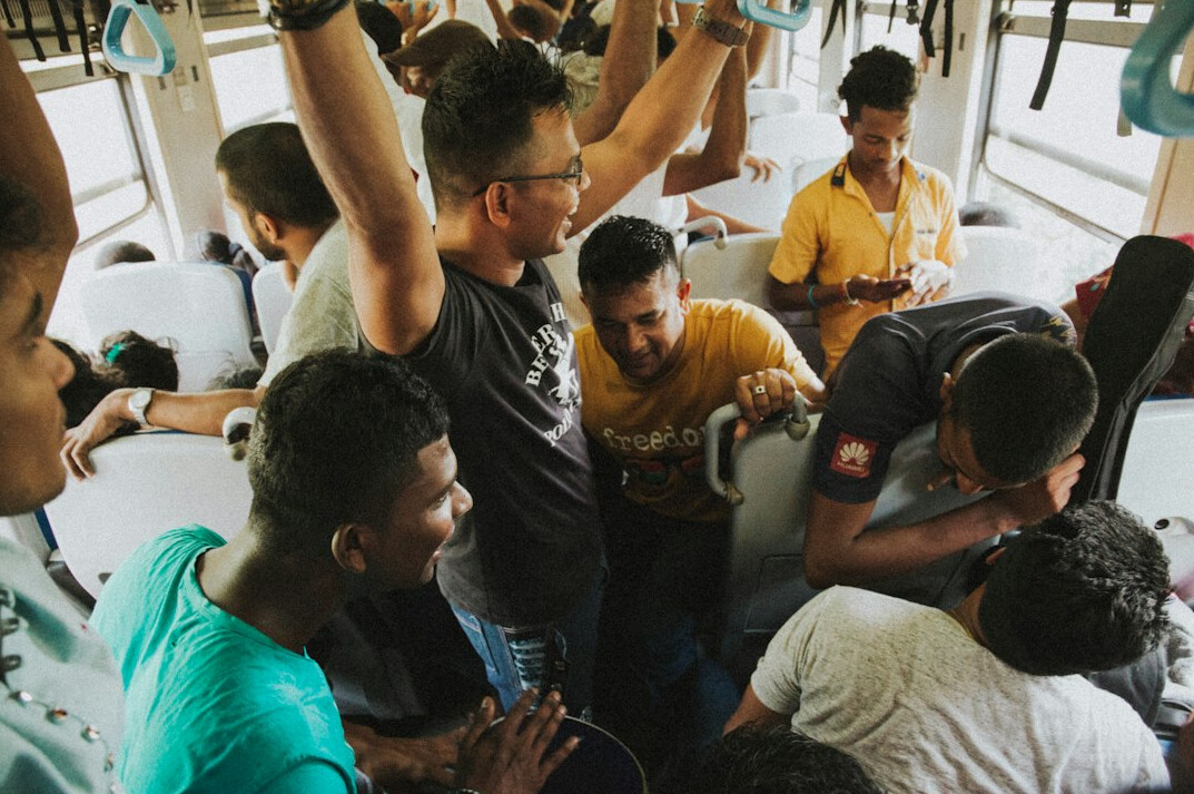diverse migrants in discussion